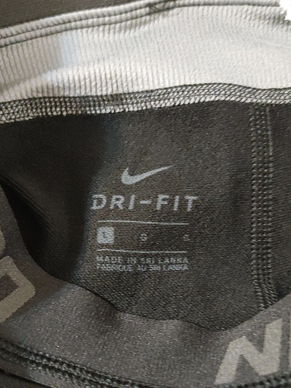 Nike Kids Black Cropped Leggings with White Swoosh